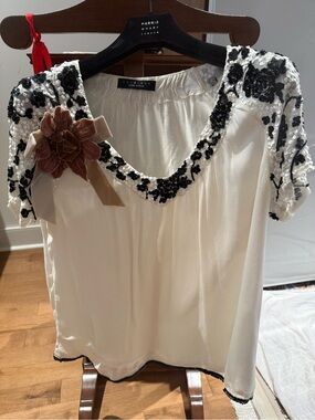 Twin-Set Cream Blouse with Black Sequin Embellishment and Brown Floral Accent